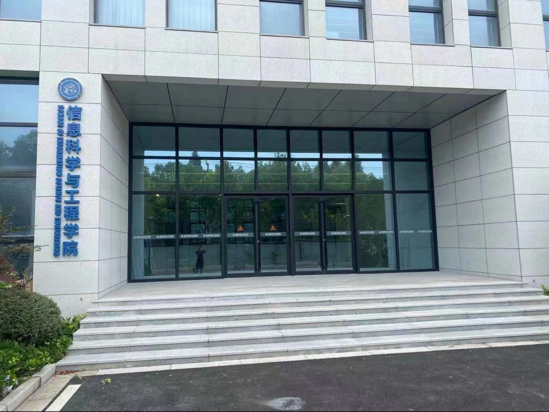 School entrance with coordinated exterior identification signage